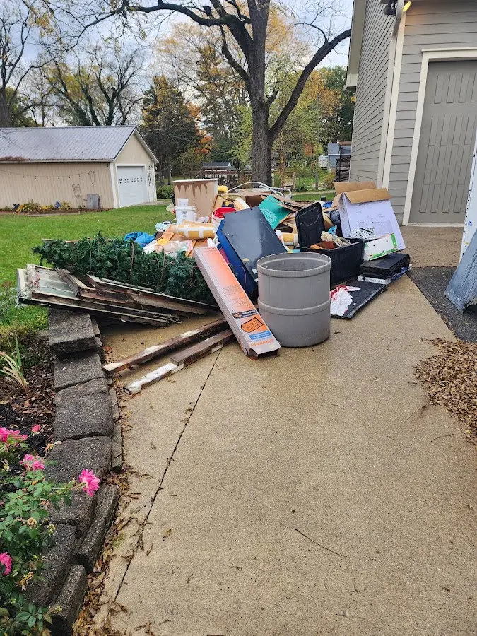Dumpster being loaded with debris for 30 Yard Dumpster Rental in Kenhorst